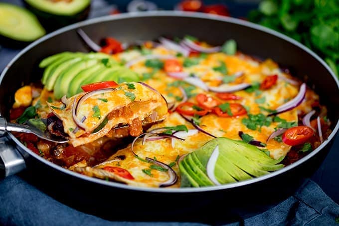 https://www.kitchensanctuary.com/wp-content/uploads/2018/05/Loaded-Mexican-tortilla-pan-recipe-wide-FS.jpg