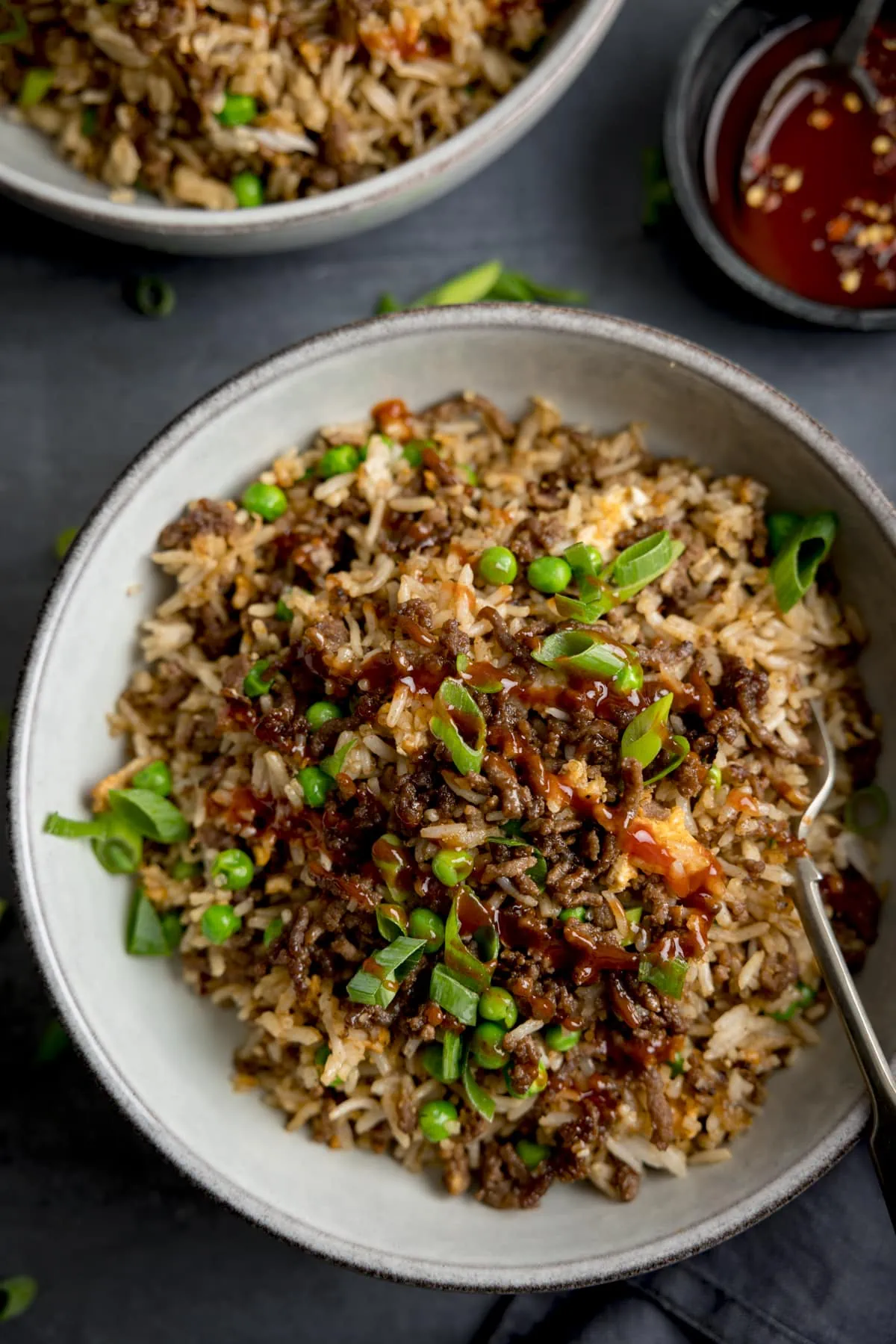 https://www.kitchensanctuary.com/wp-content/uploads/2022/09/Mince-Beef-Fried-Rice-tall1-52-1.webp