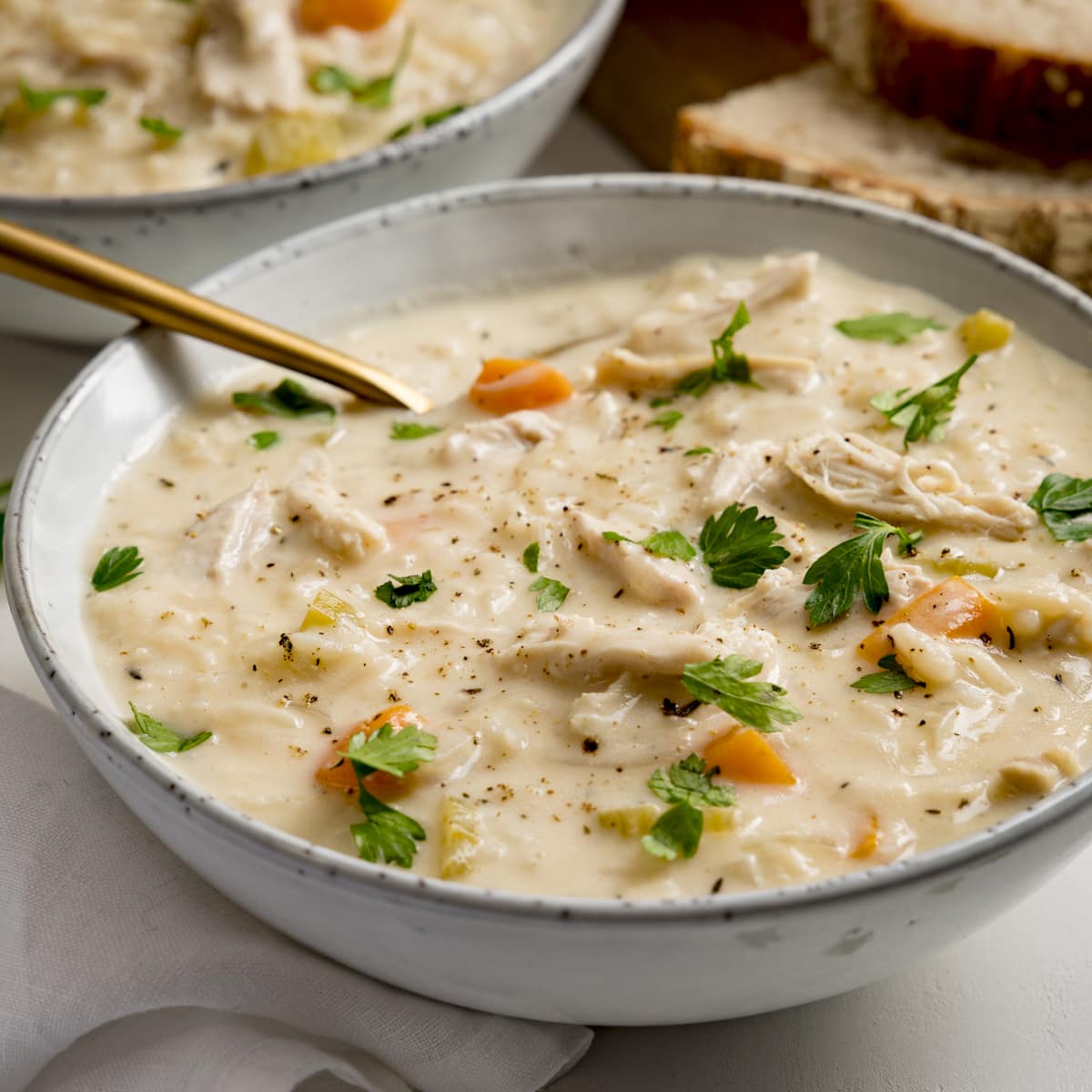 https://www.kitchensanctuary.com/wp-content/uploads/2023/01/Chicken-and-rice-soup-square-FS-22.jpg